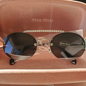 Miu Miu Black Oval Sunglasses with Crystal Brow Bar